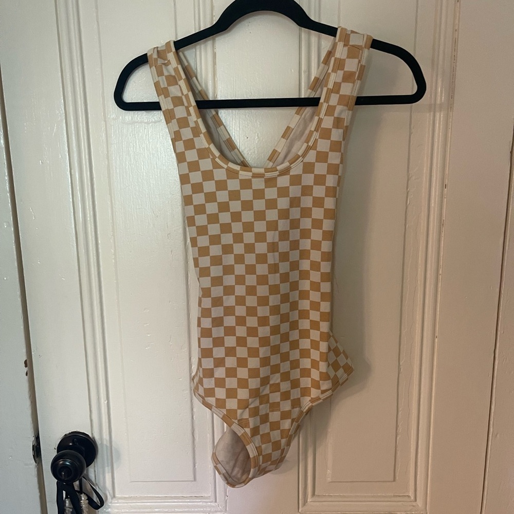 Woman’s ARQ Checkered bodysuit